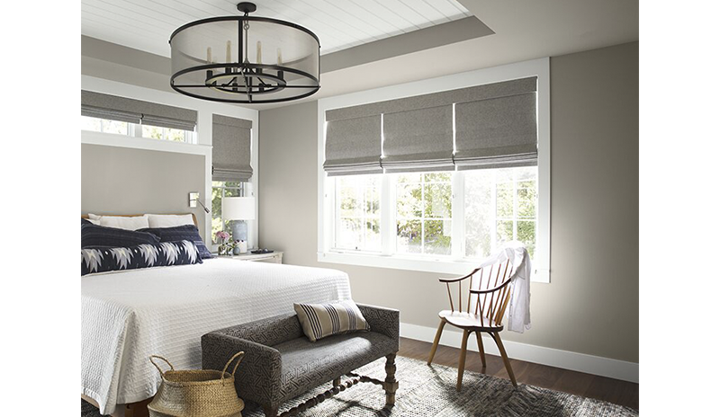 Naturally light gray bedroom with matching blinds. Naturally light gray bedroom with matching blinds.